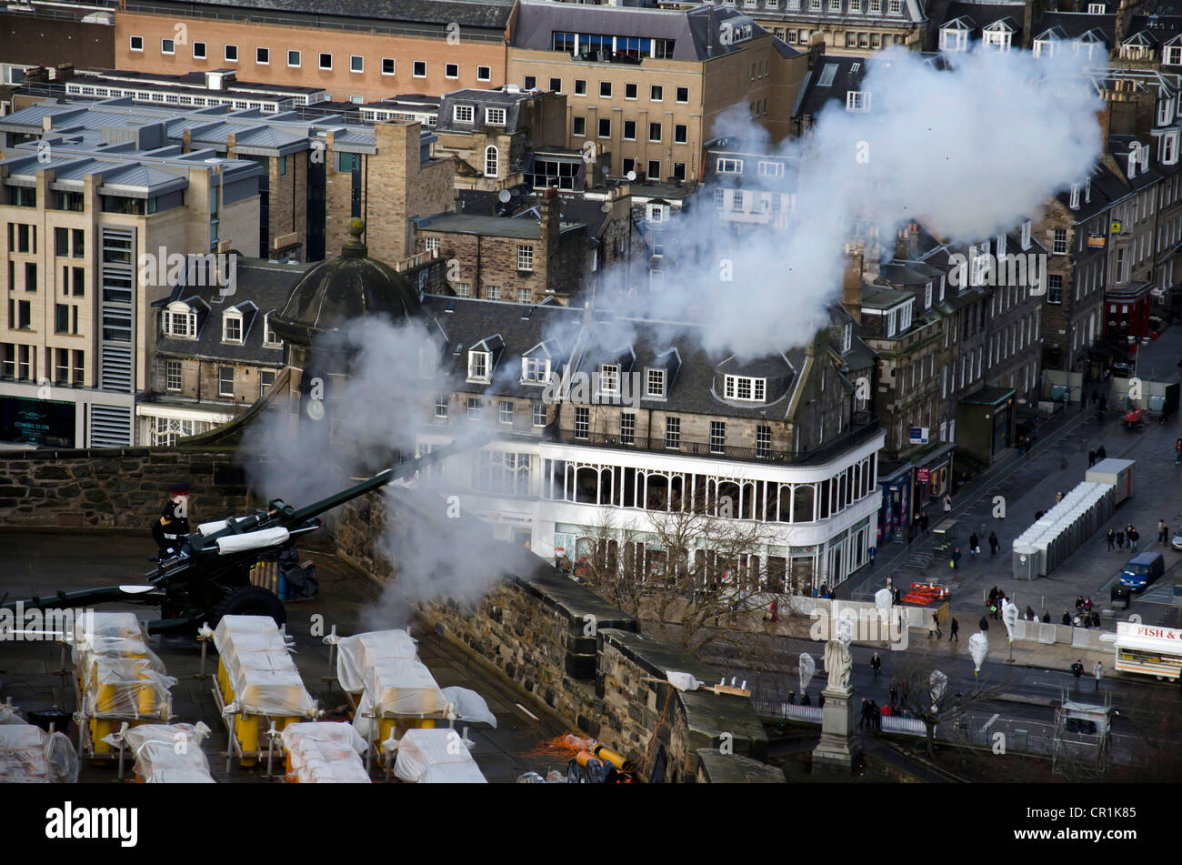 The One O'clock Gun being fired, surrounded by fireworks ready for the