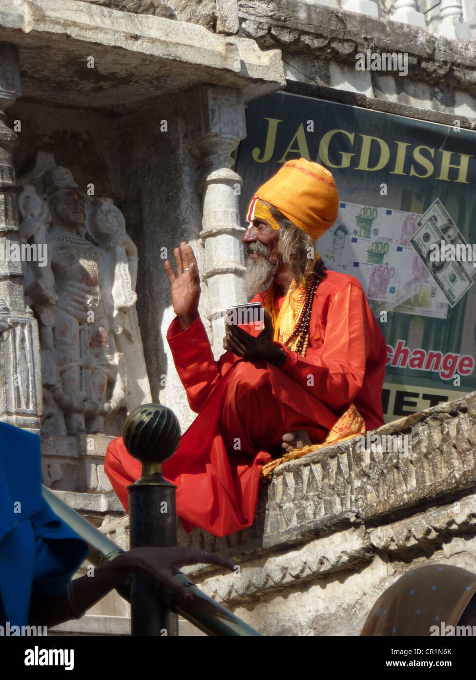 UDAIPUR, INDIA - DEC 2 -Hindu Sadhu gives blessings outside a temple on Dec 2, 2009 in Udaipur, India Stock Photo