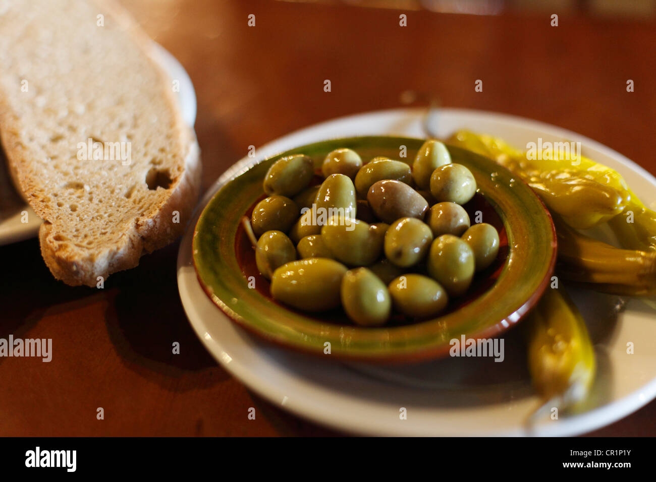 Plate with olives, restaurant C'al Dimoni, Algaida, Majorca, Balearic Islands, Spain, Europe Stock Photo
