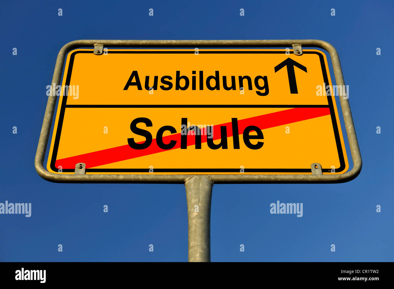 Sign, city limit, symbolic image for the transition from Schule or school to Lehre or vocational training Stock Photo