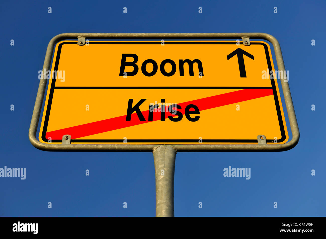 City limit sign, symbolic image for the way from a Krise to a Boom, German for going from an economic crisis to an economic boom Stock Photo