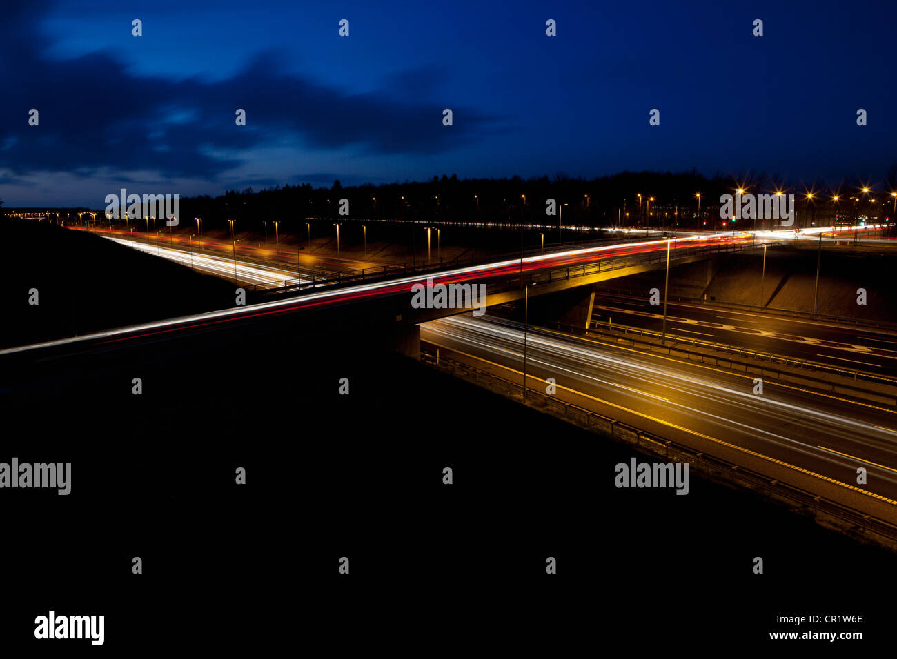 Time lapse view of traffic at night Stock Photo