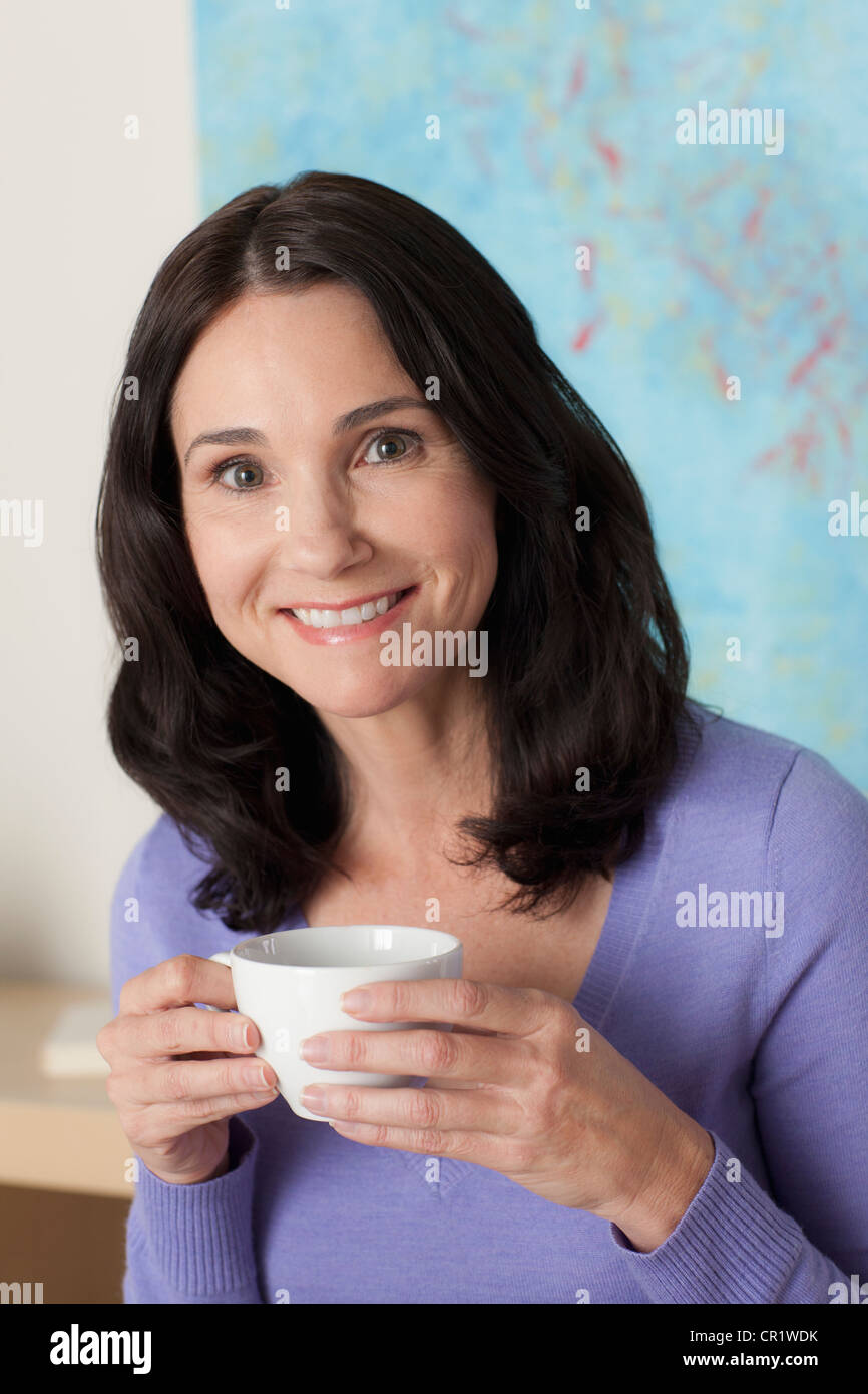 USA, California, Los Angeles, Portrait of mature woman drinking tea