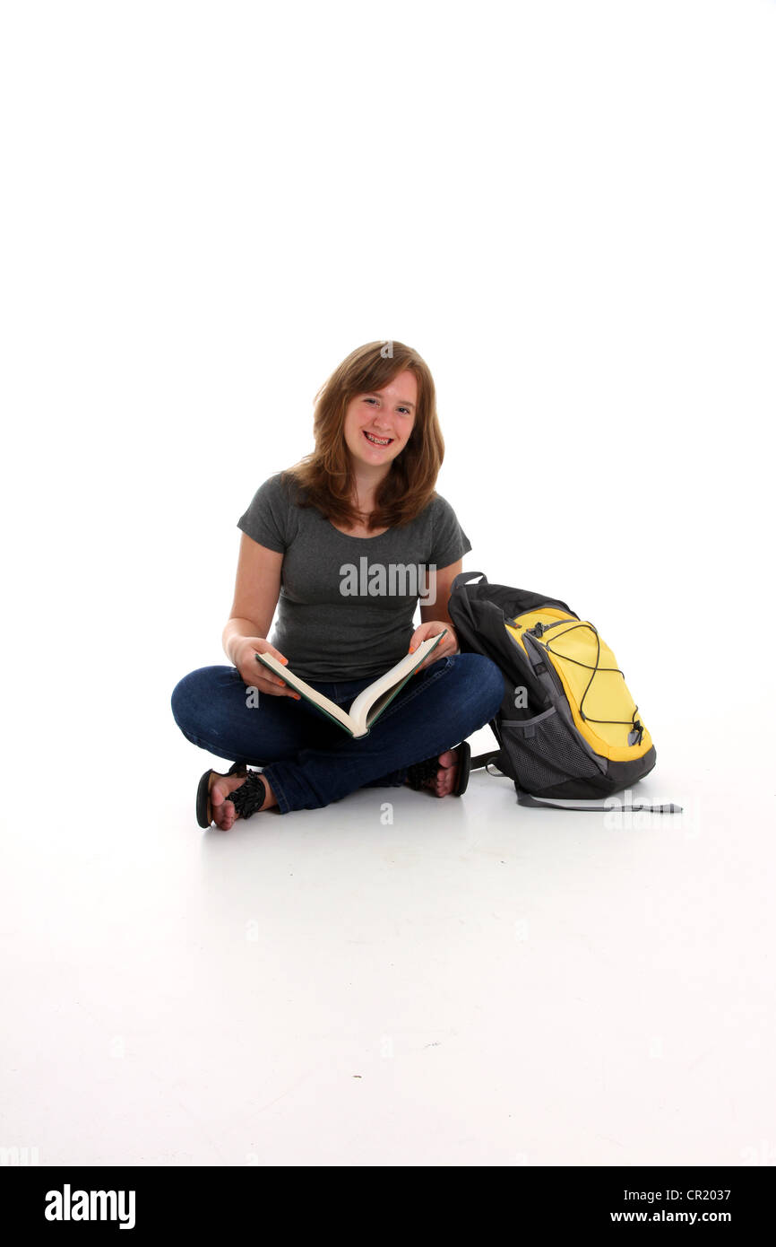 Teenage Girl Reading a Book on White Background Stock Photo - Alamy