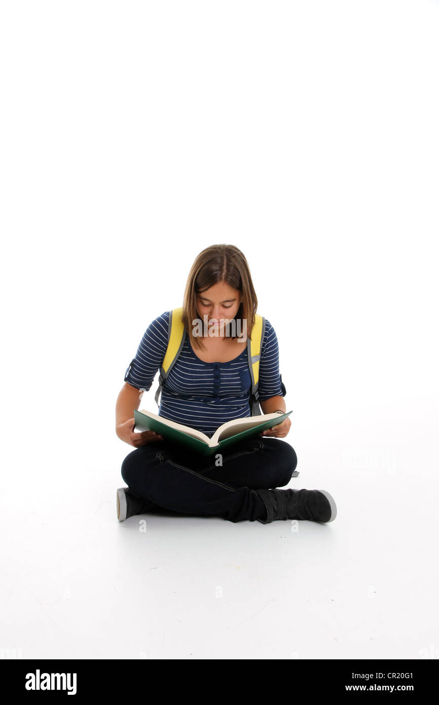 Teenage Girl Reading a Book on White Background Stock Photo - Alamy