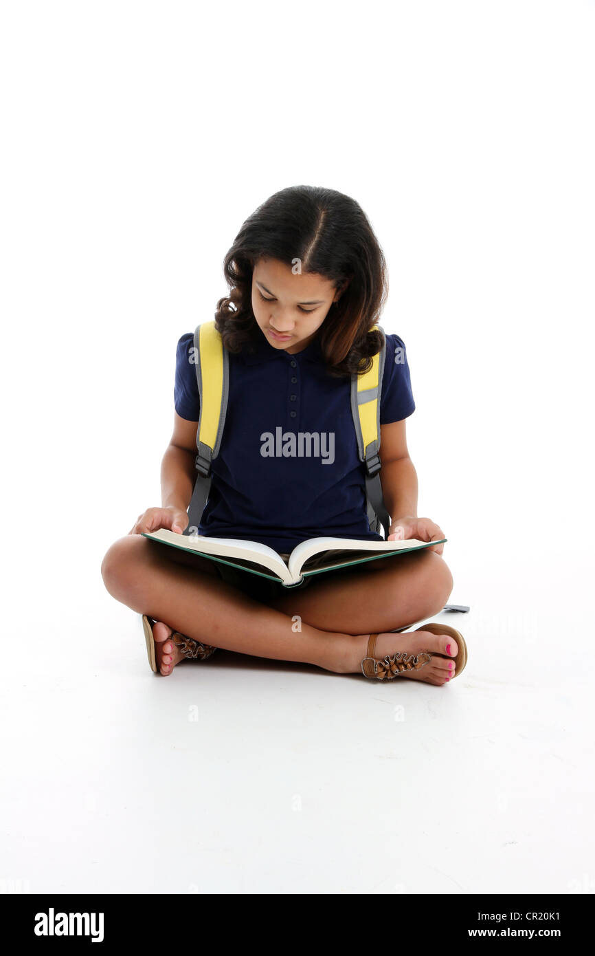 Young Teenage Girl Reading a Book on White Background Stock Photo - Alamy