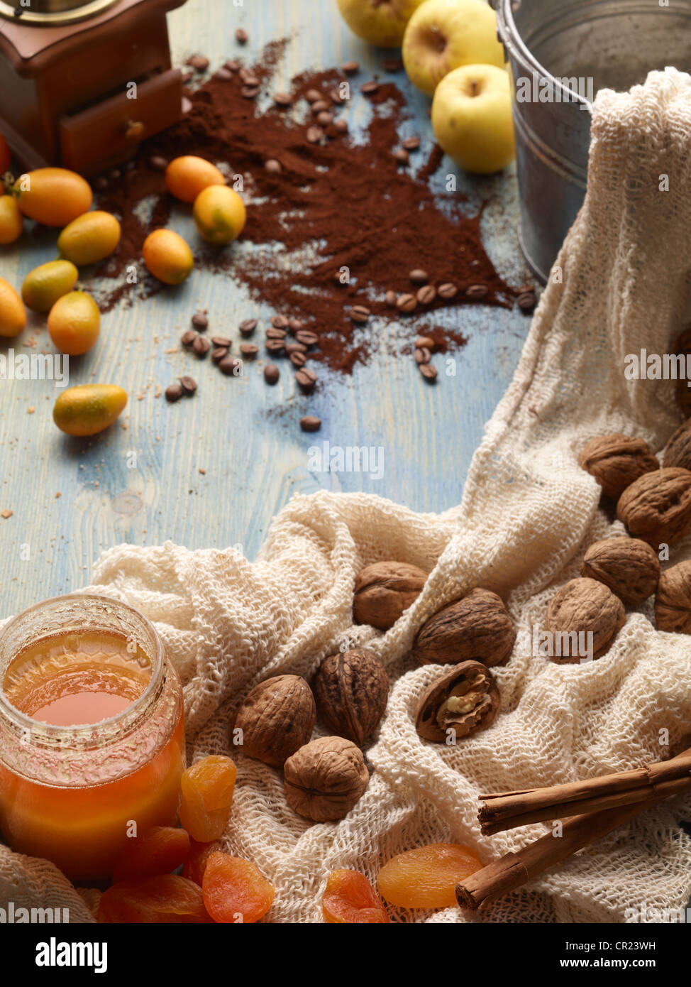 Nuts, jam, coffee and fruit on table Stock Photo