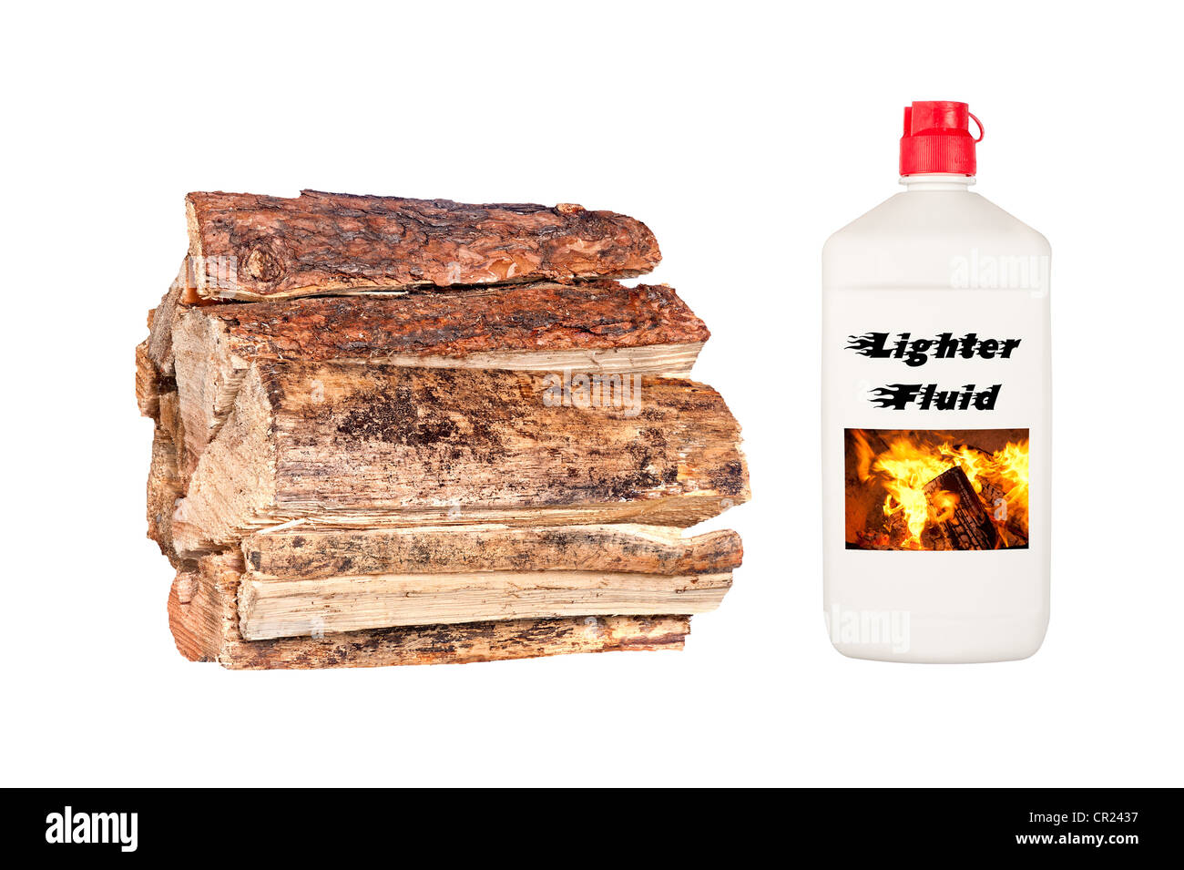 A stack of dry, fresh firewood isolated on white with a bottle of lighter fluid. Stock Photo