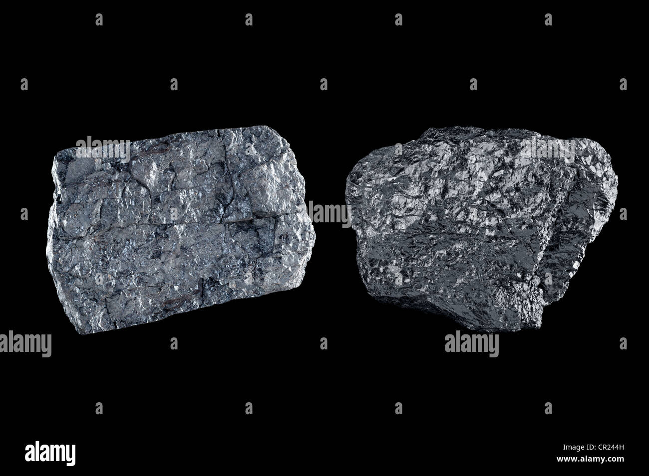 Two chunks of bituminous coal use to generate power isolated on black. Stock Photo