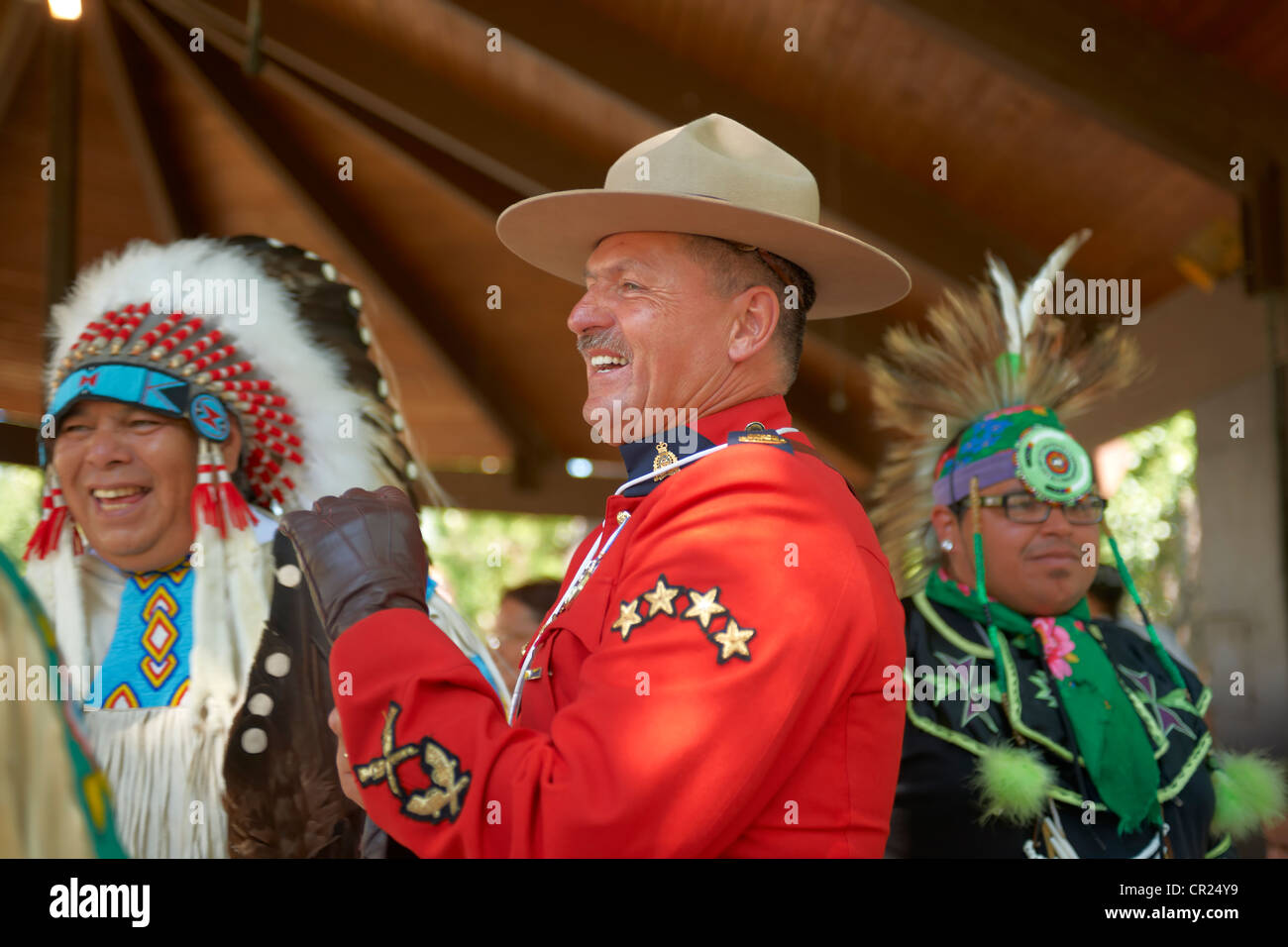 RCMP with first nations people Stock Photo