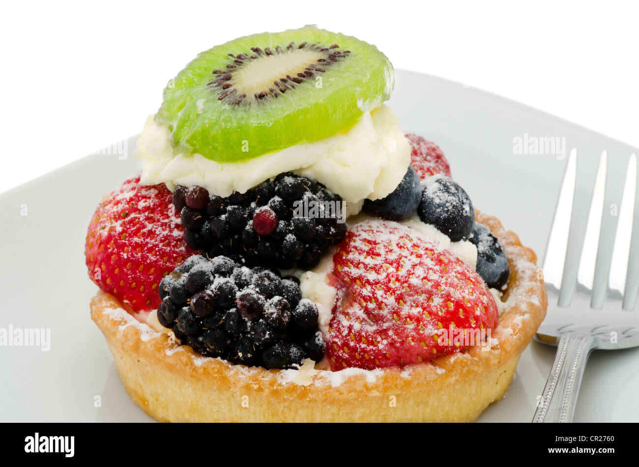 Close-up of a fresh summer fruit tart isolated on a white background Stock Photo