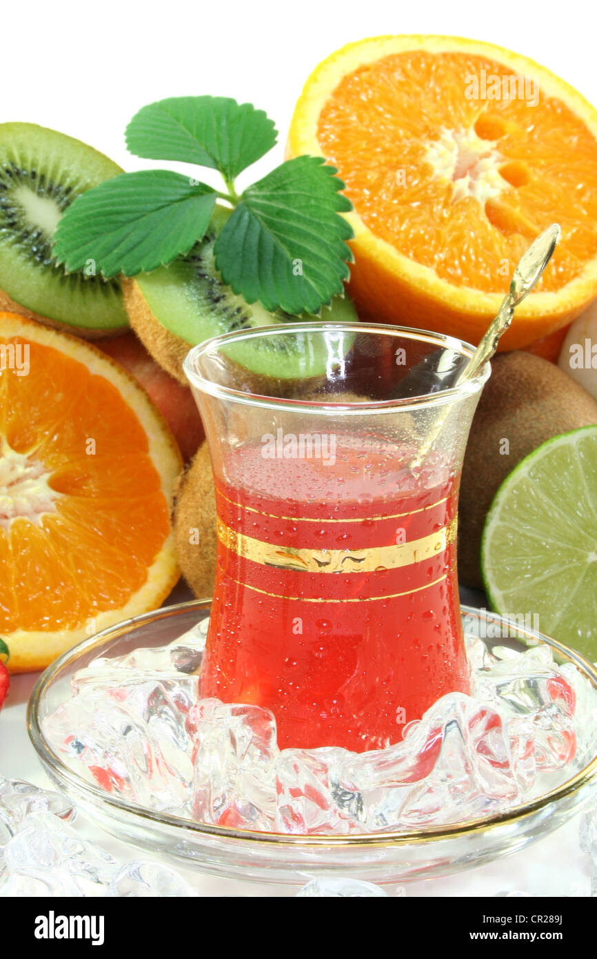Fruit iced tea with fresh fruit and ice cubes Stock Photo Alamy
