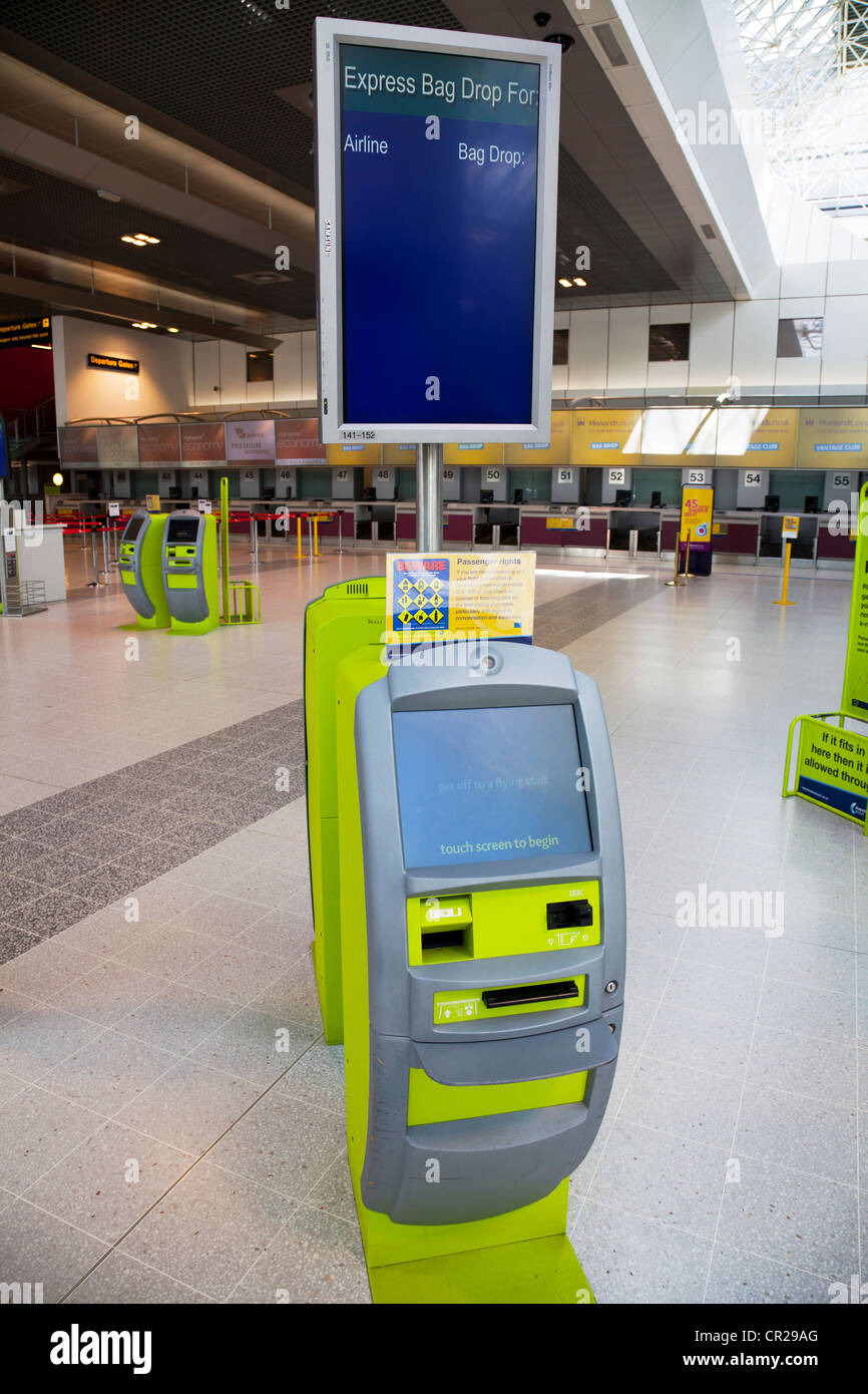 Self service express check in bag drop unit in Manchester Airport