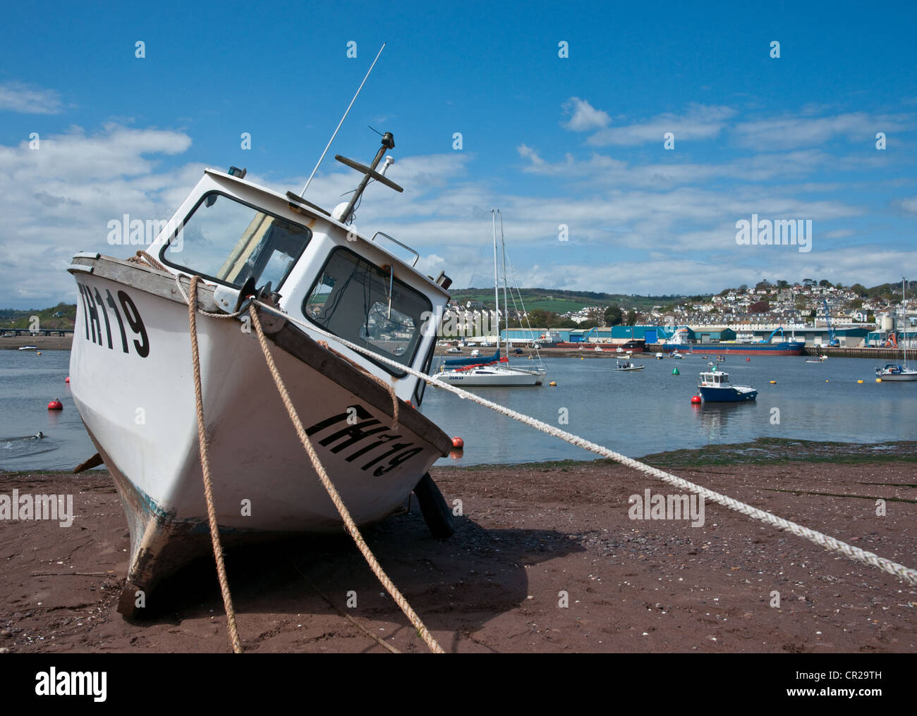 Fishing boat moored on the beach at Teignmouth Stock Photo