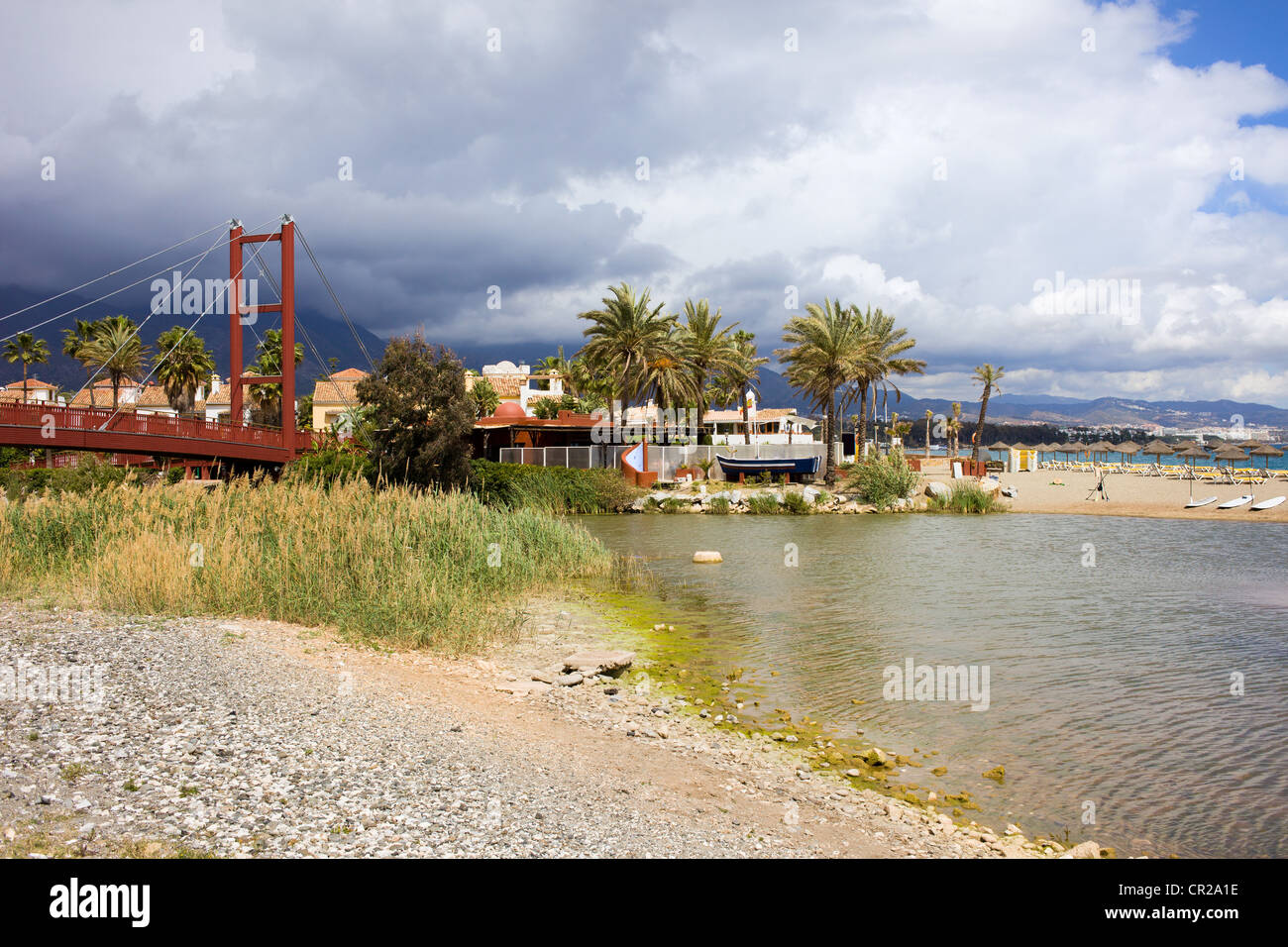 Green river on scenic Costa del Sol in Spain between resorts towns of  Marbella and Puerto Banus, Andalucia Stock Photo - Alamy