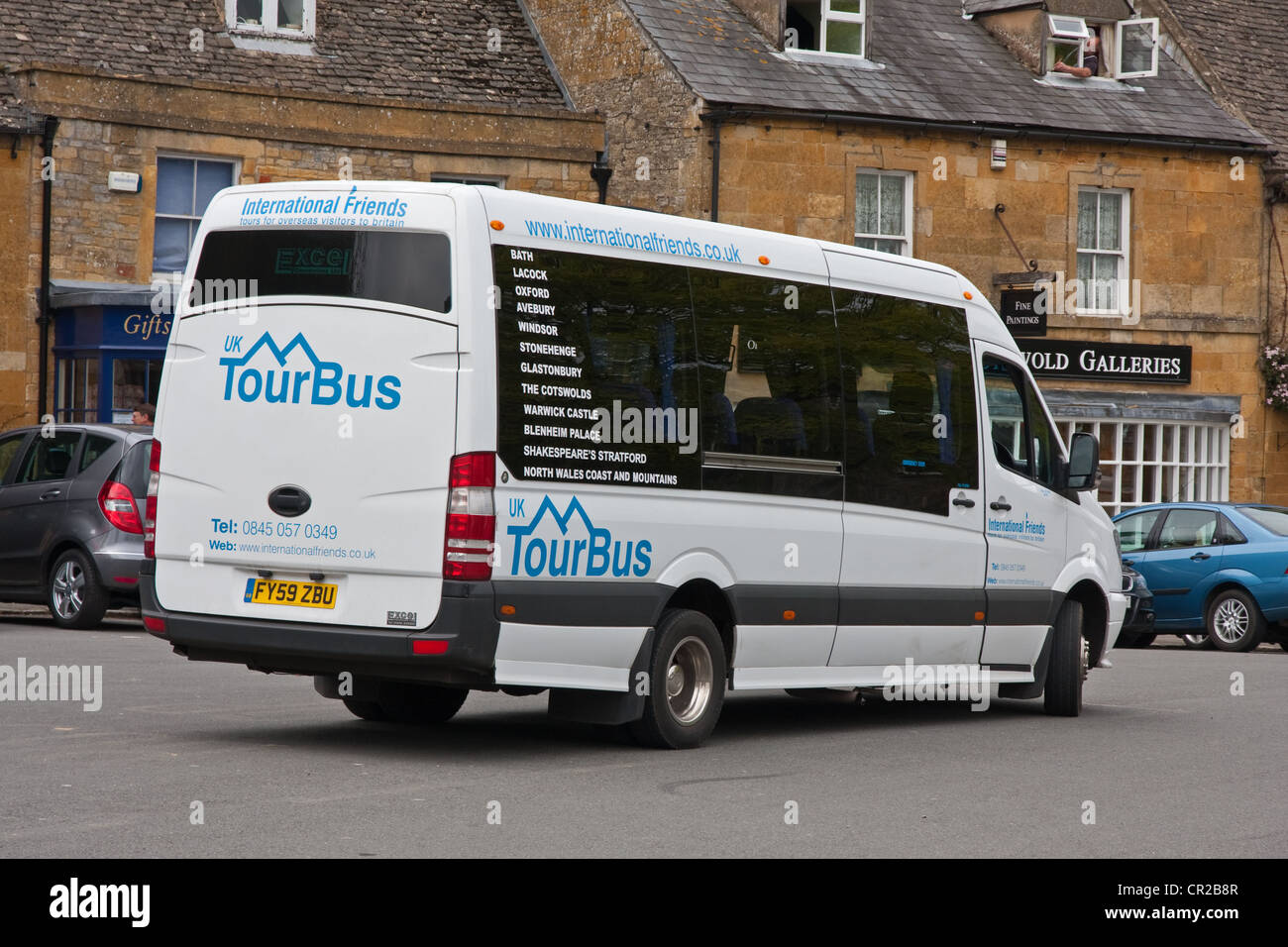 Tourist mini-bus in Cotswold town of Stow-on-the-Wold Stock Photo