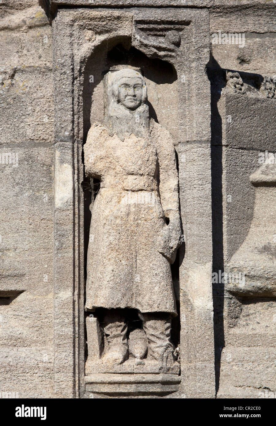 Stone Figure on facade of St Peter and Paul Church Stock Photo