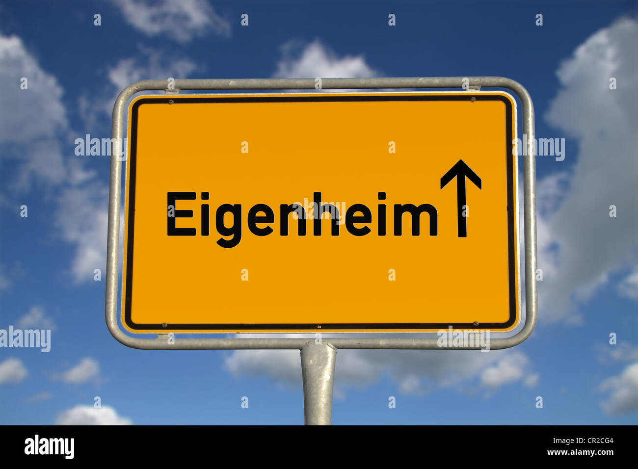 German road sign traffic owned home with blue sky and white clouds Stock Photo