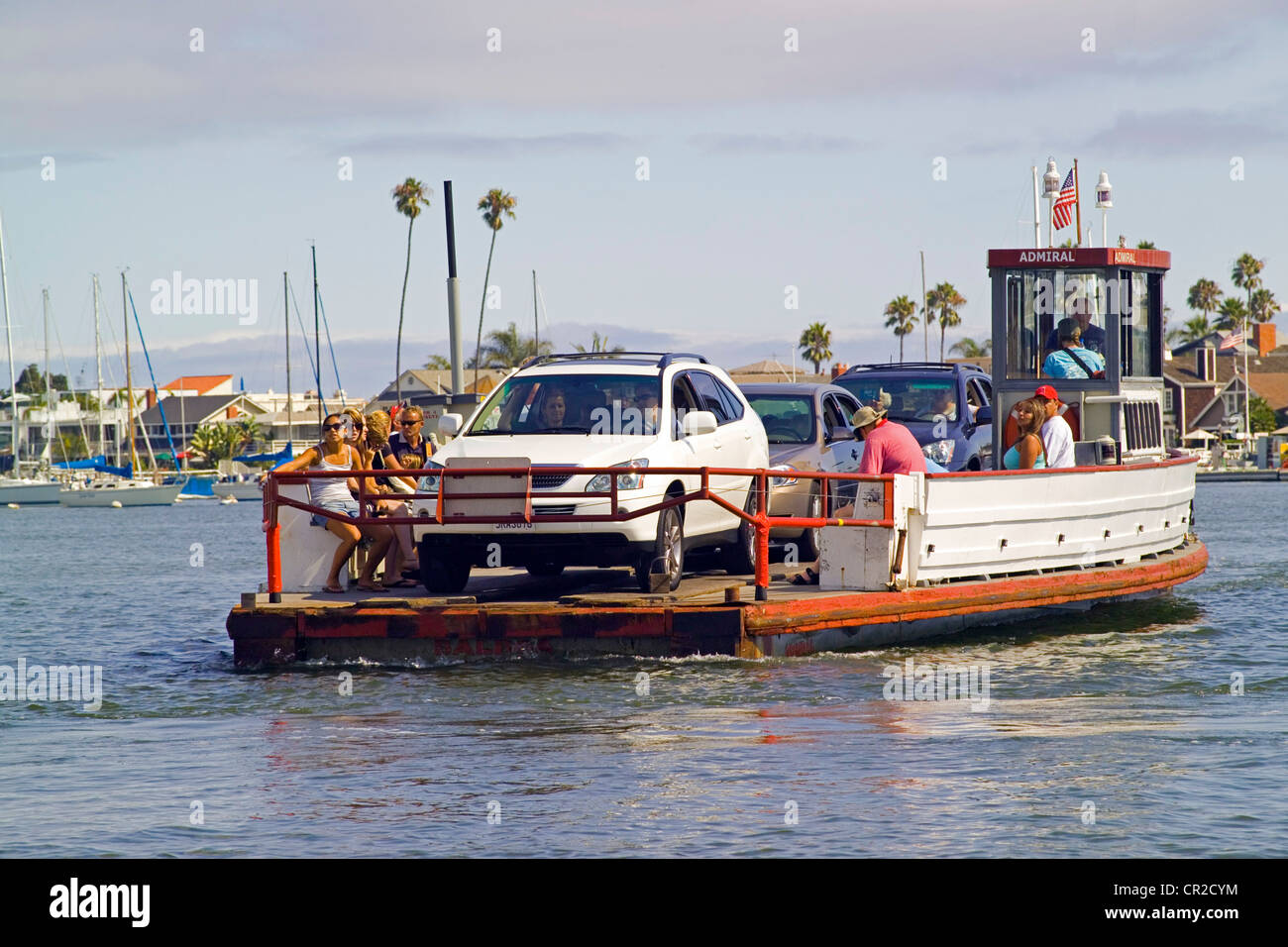 Historic threecar ferryboats cross Newport Harbor between the Fun Zone