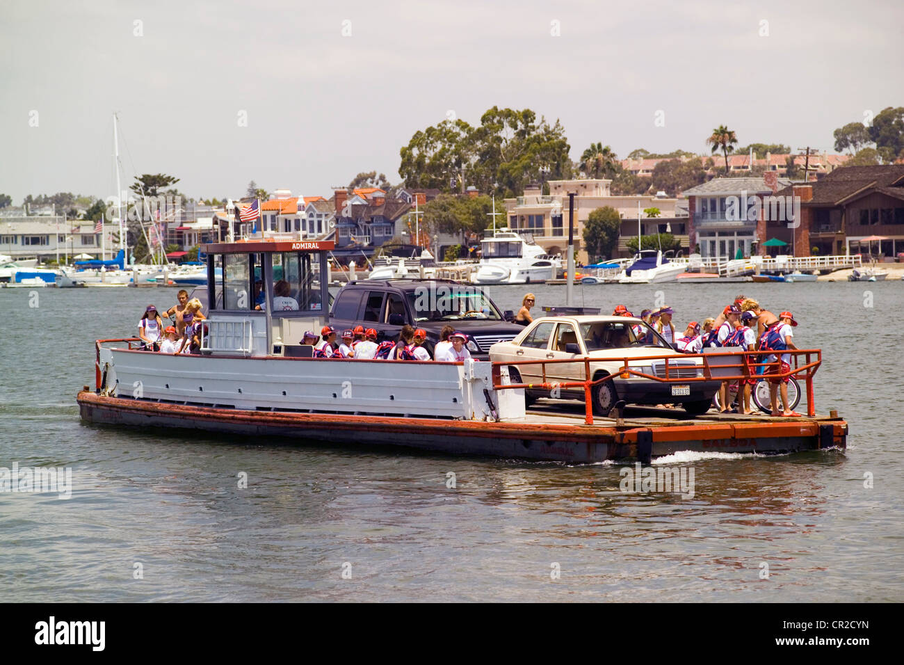 Historic threecar ferryboats cross Newport Harbor between the Fun Zone