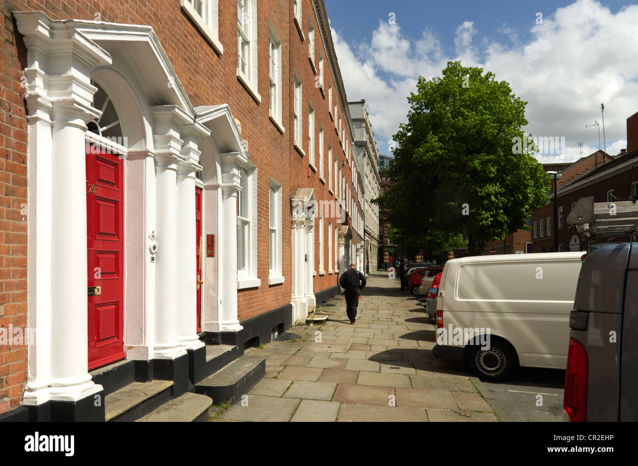 a-view-of-st-john-street-manchester-showing-a-building-with-red-brick