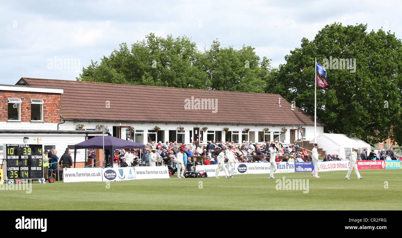 Players come onto the field at Horsham Cricket Club. Picture by James Boardman. Stock Photo