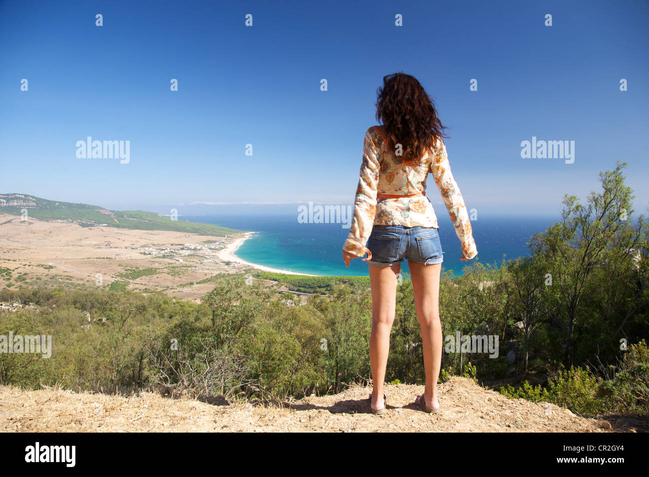 Woman over Bolonia beach at Cadiz Andalusia in Spain Stock Photo