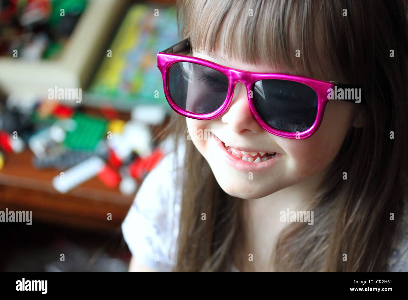 Portrait of beautiful young girl smiling with sunglasses Stock Photo ...