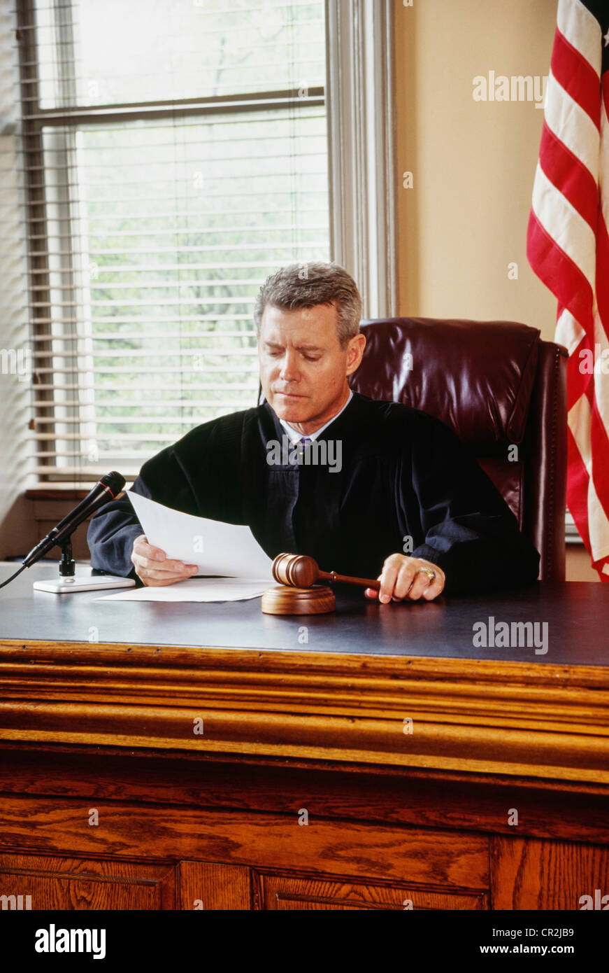 Judge in robe with gavel in courtroom, USA Stock Photo Alamy