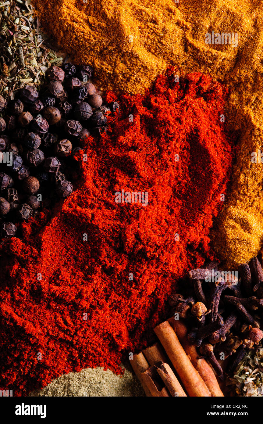 Spice background with different colored spices Stock Photo