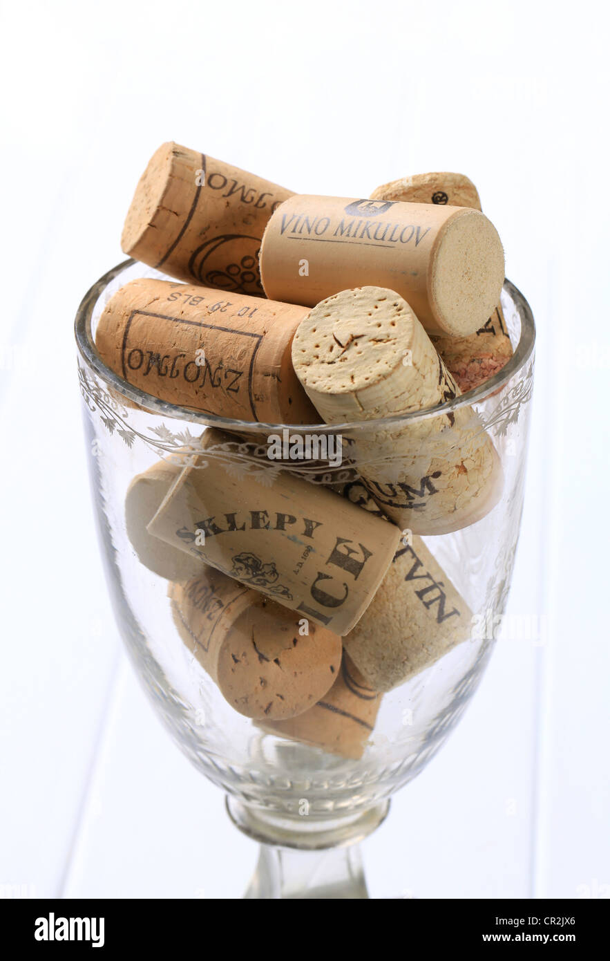 Cork bottle stoppers in a wine glass Stock Photo Alamy