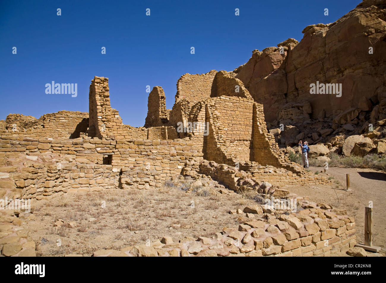The sandstone walls of the Anasazi great house of Kin Kletso, in Chaco ...