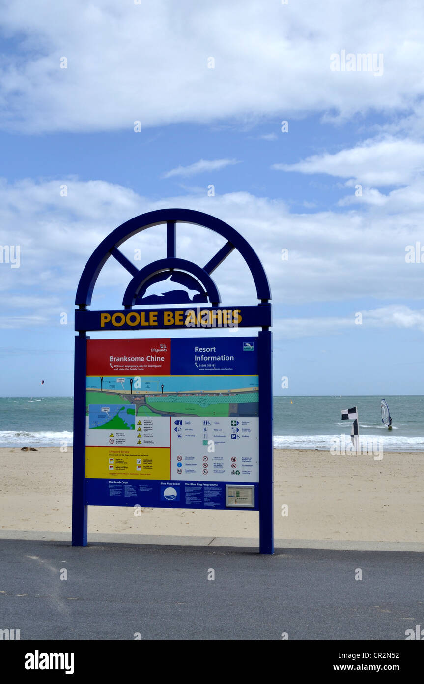 Beach sign at Branksome Chine beach, Poole, Dorset, on a windy and showery day in June. Stock Photo