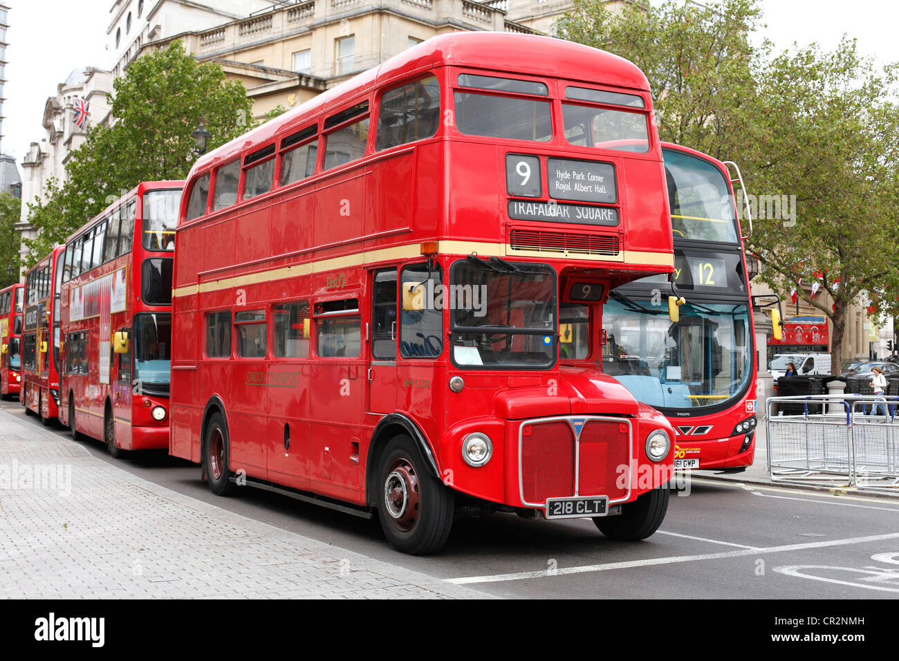 A red Routemaster bus on a London street. Stock Photo