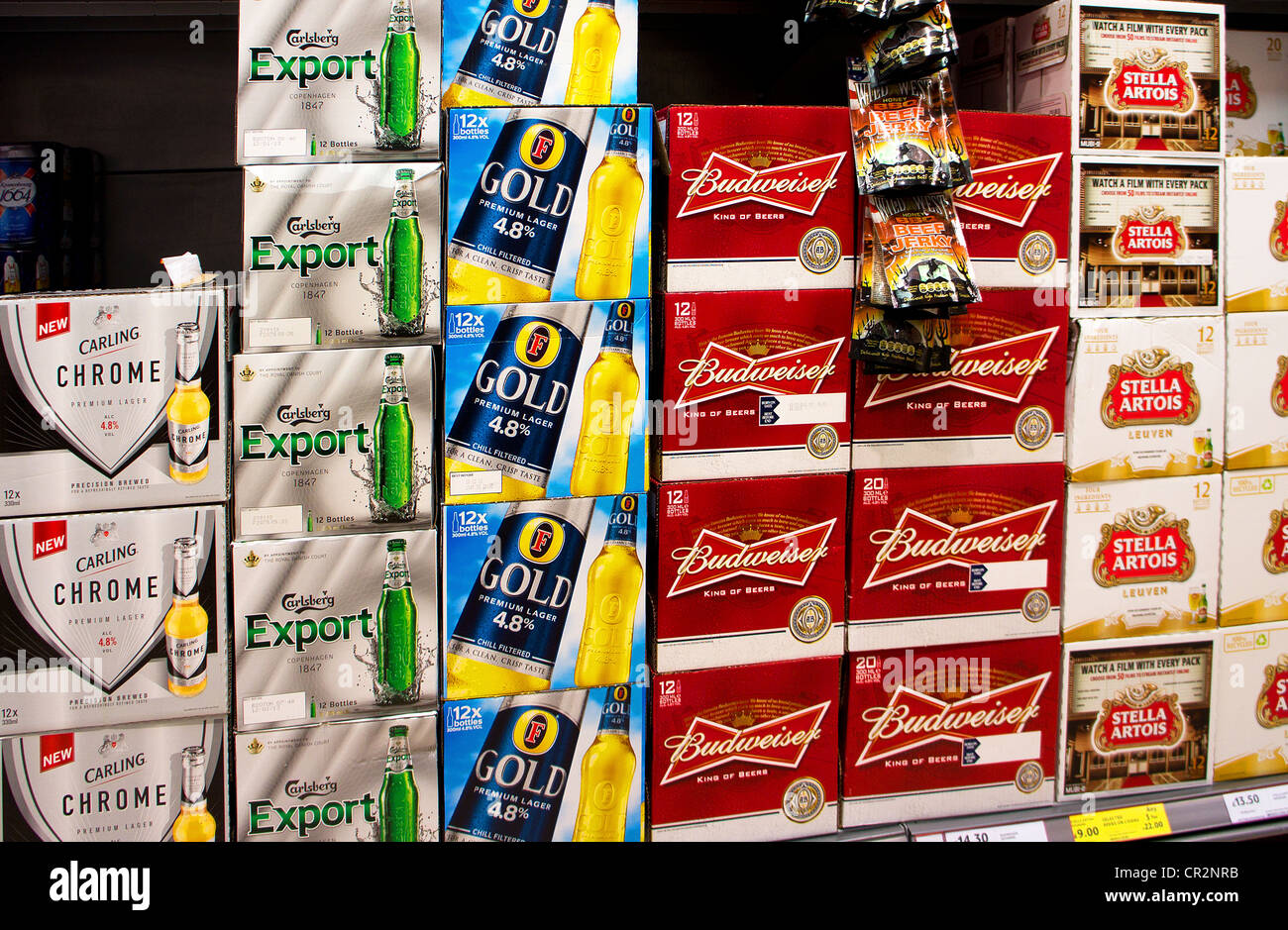 cases of beer in a uk supermarket Stock Photo