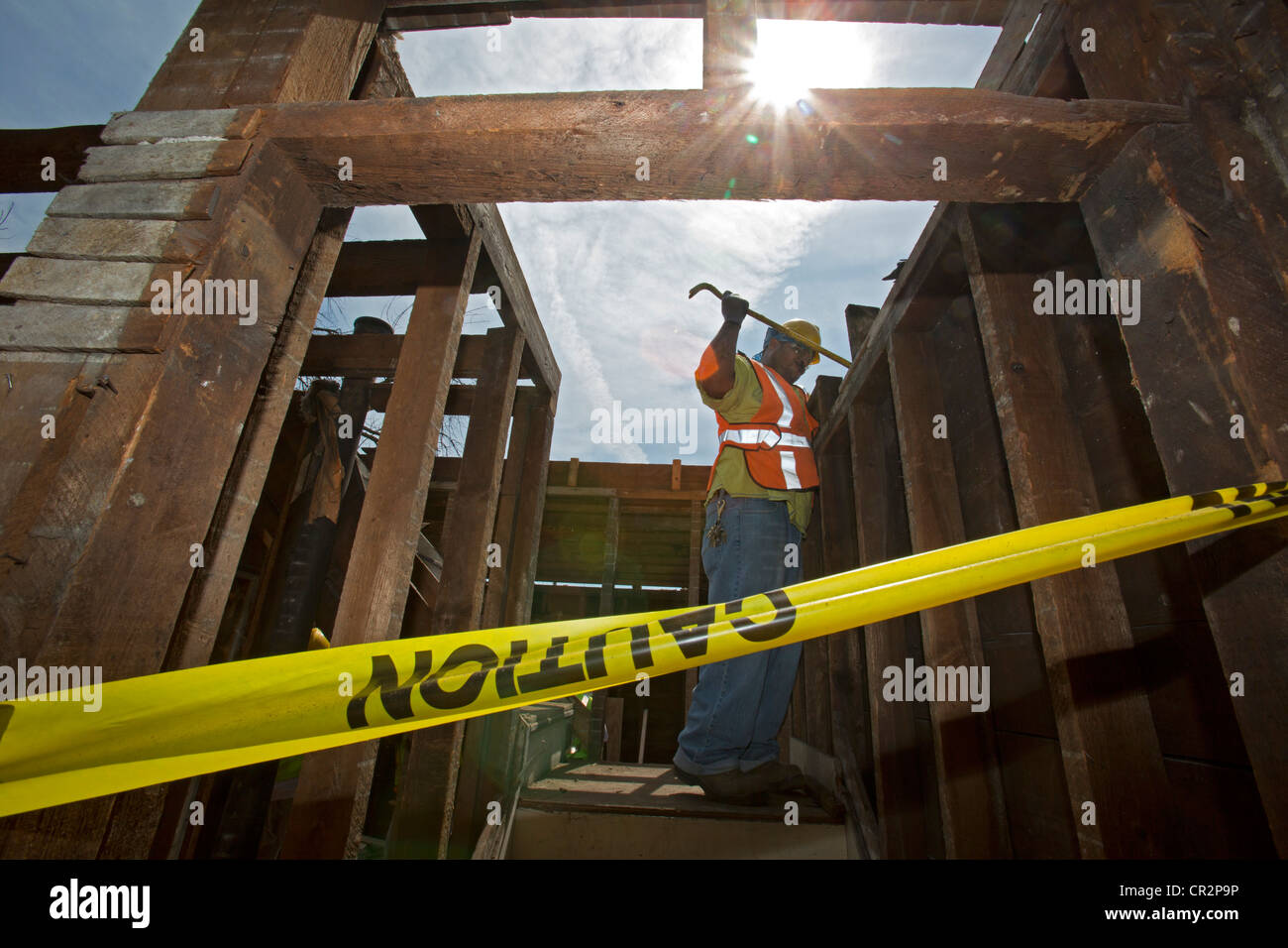 Workers Salvage Building Materials from House Being "Deconstructed