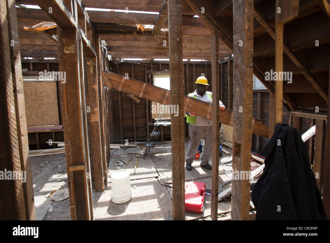 Workers Salvage Building Materials from House Being "Deconstructed