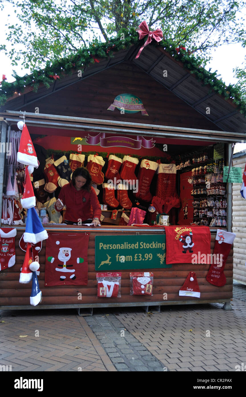 Stall selling personalised stockings and decorations at the Christmas Market in Bournemouth Town Centre, 2011. Stock Photo