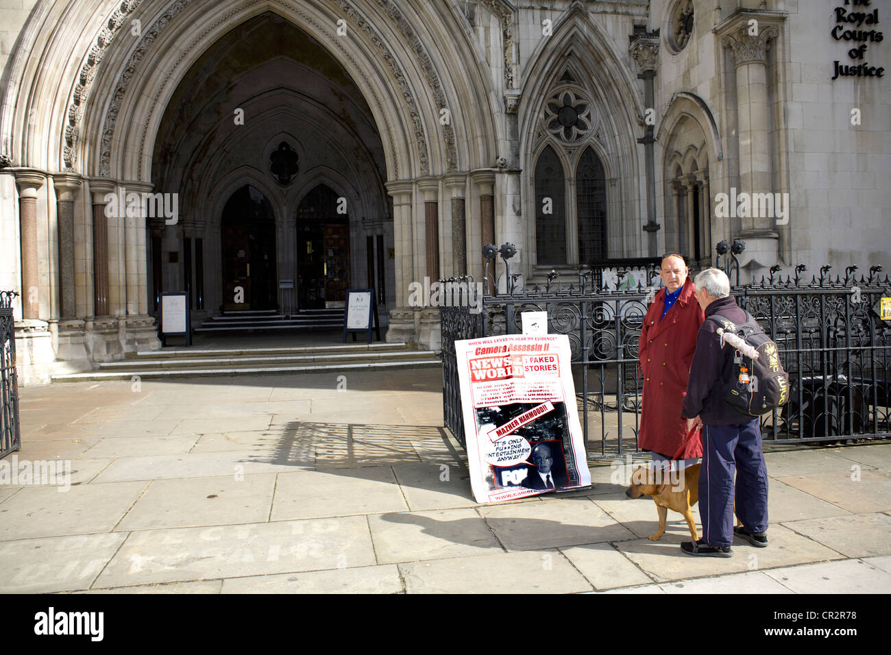 Former News of the World photographer Ian Cutler demonstrates during the Leveson Enquiry outside the Royal Courts of Justice Stock Photo