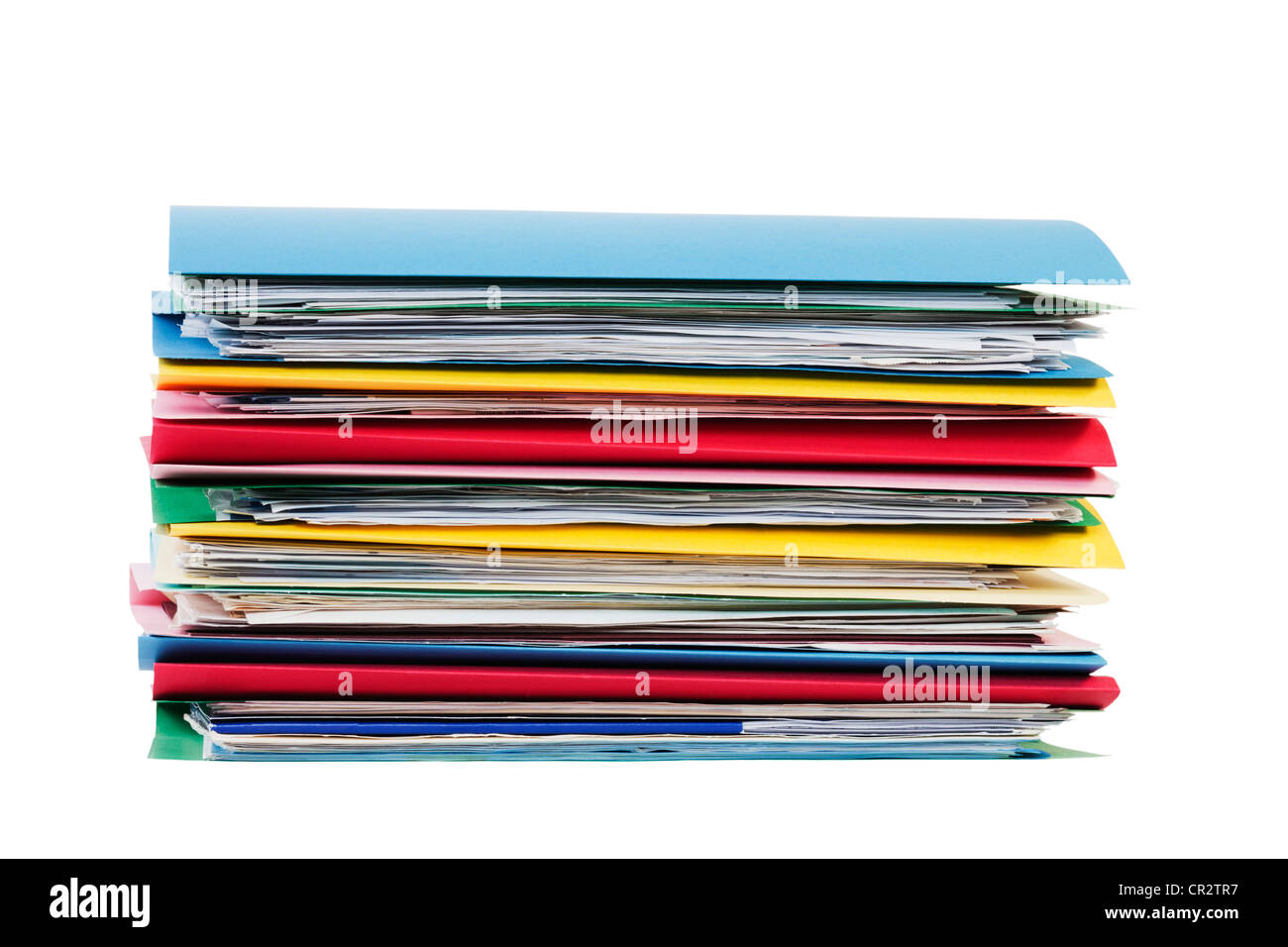 A stack of files, full of paperwork, isolated on white with clipping path. Stock Photo