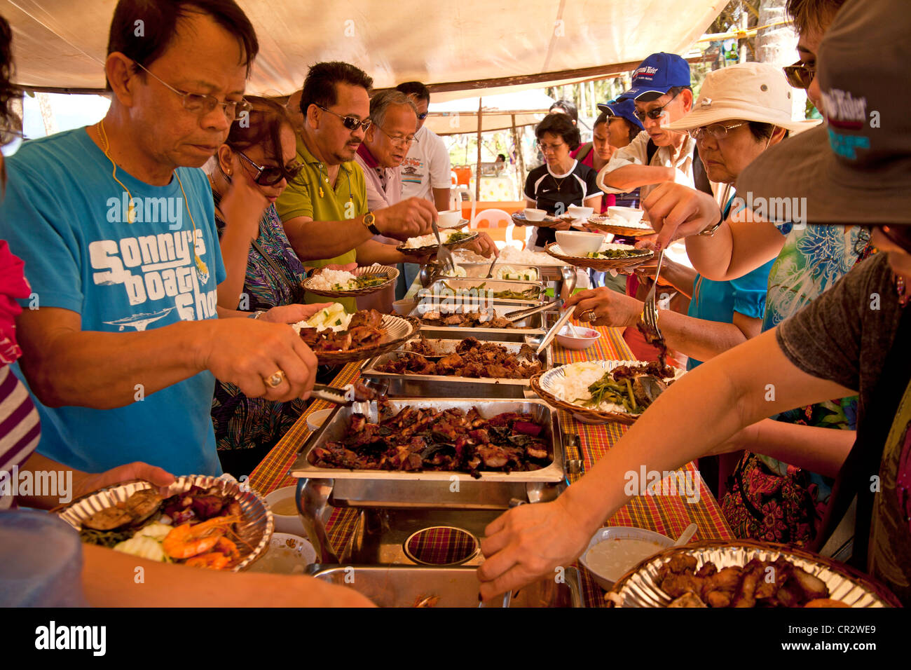 local day trippers at a lunch buffet in Sabang, Palawan, Philippines, Asia Stock Photo