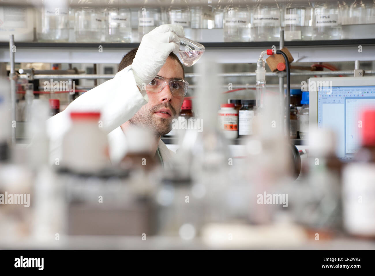 male laboratory technician working in lab Stock Photo