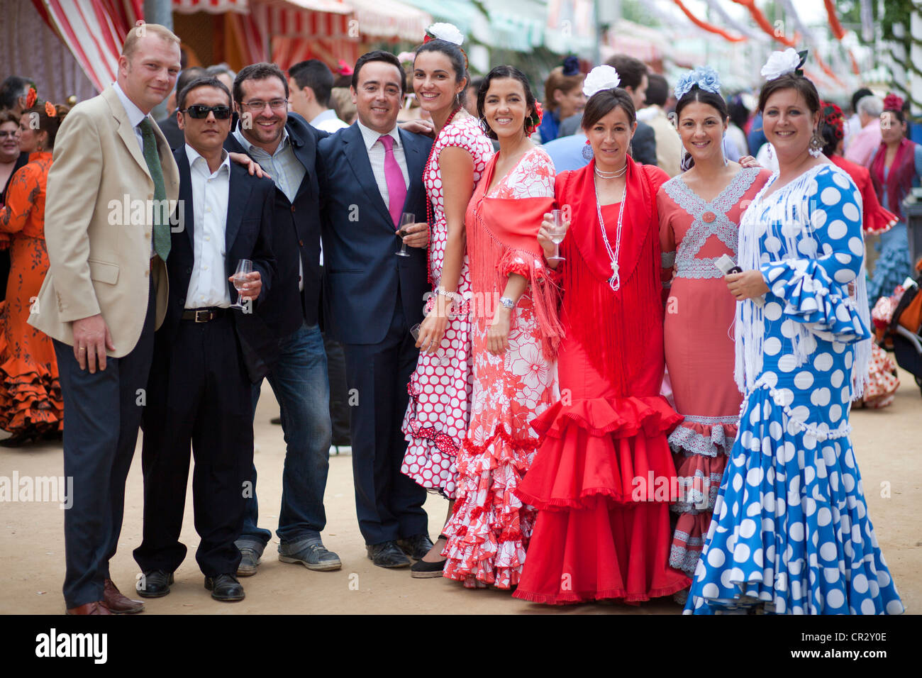 Spanish women dressed in traditional costume and Spaniards at the Stock ...