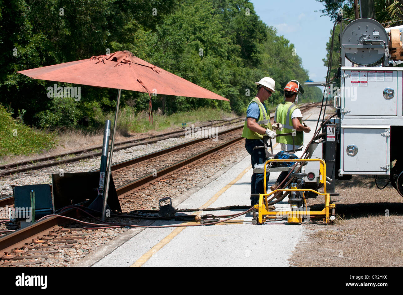 Permanent way engineers working on the railroad track close to DeLand
