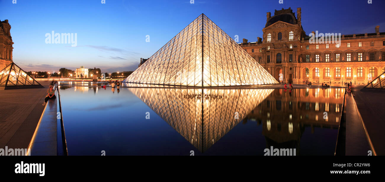 France, Paris the Louvre museum and the Louvre Pyramid by architect Ieoh Ming Pei Stock Photo