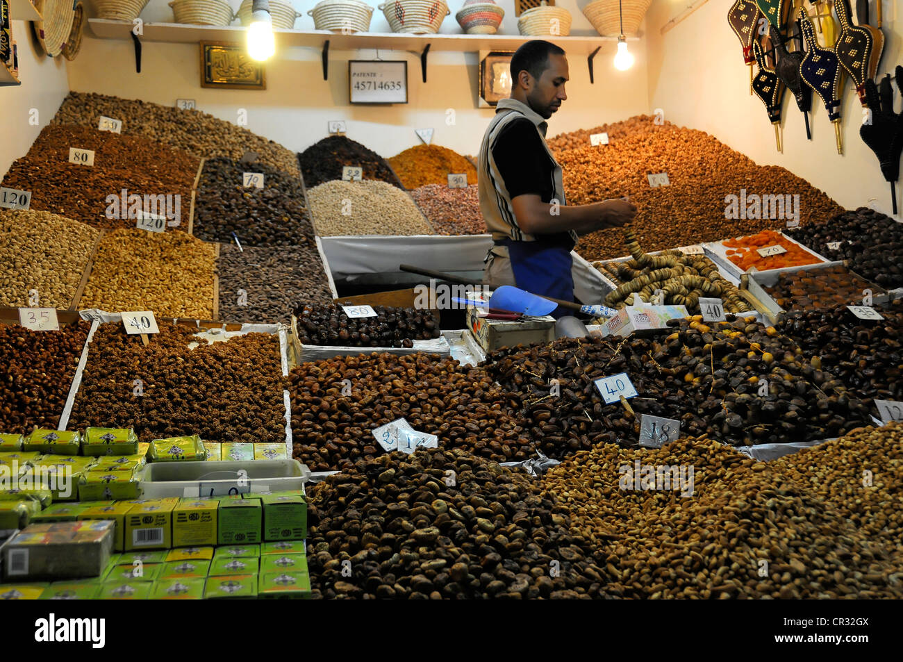 Vendor of dried fruits, nuts, dates, at his market stall, souk, souks