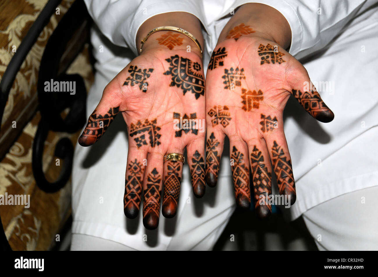 Henna tattoo on the hands of a tourist, Djemaa el-Fna square, 