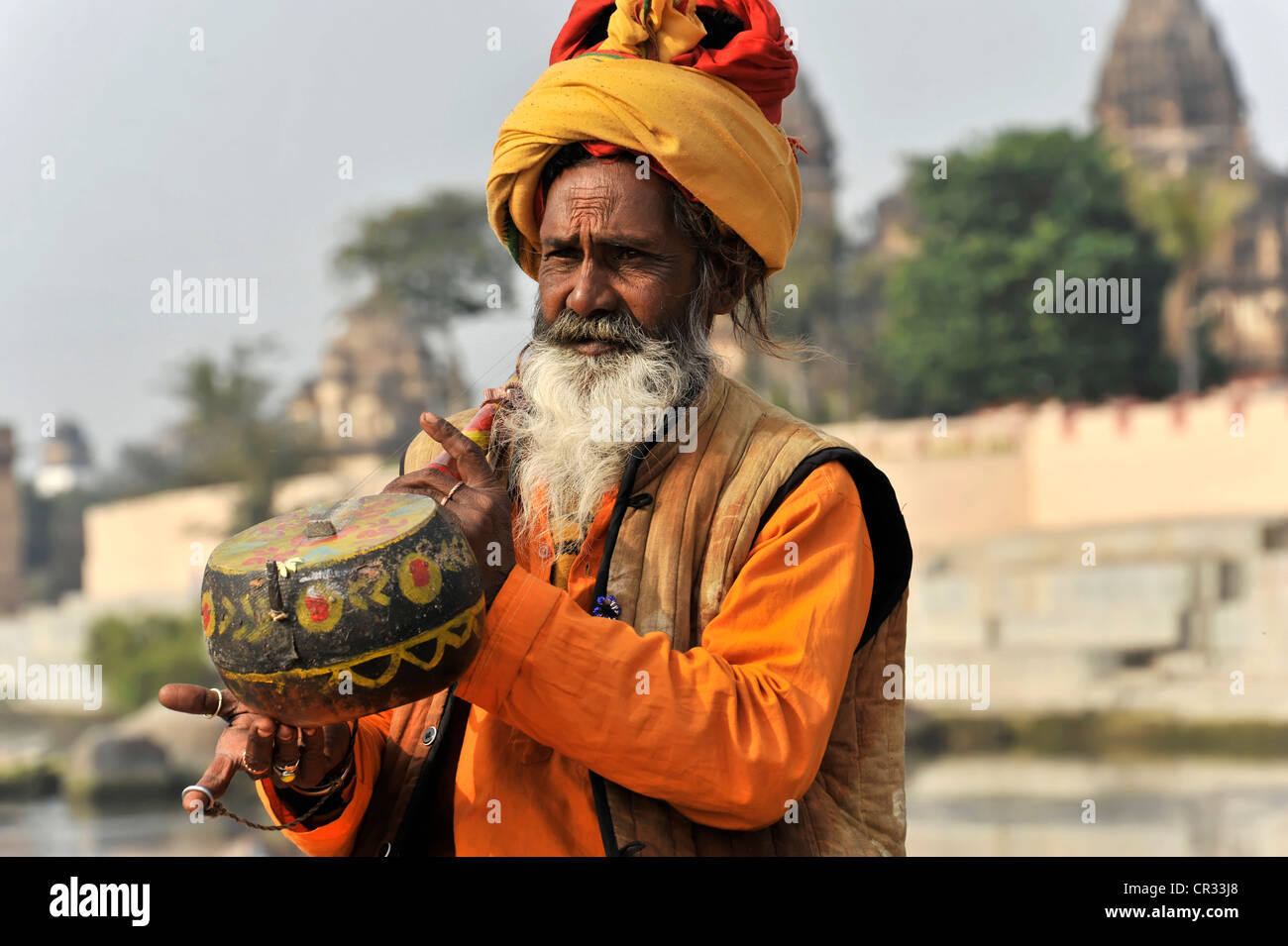 Sadhu or holy man, with musical instrument, Orchha, Madhya Pradesh ...