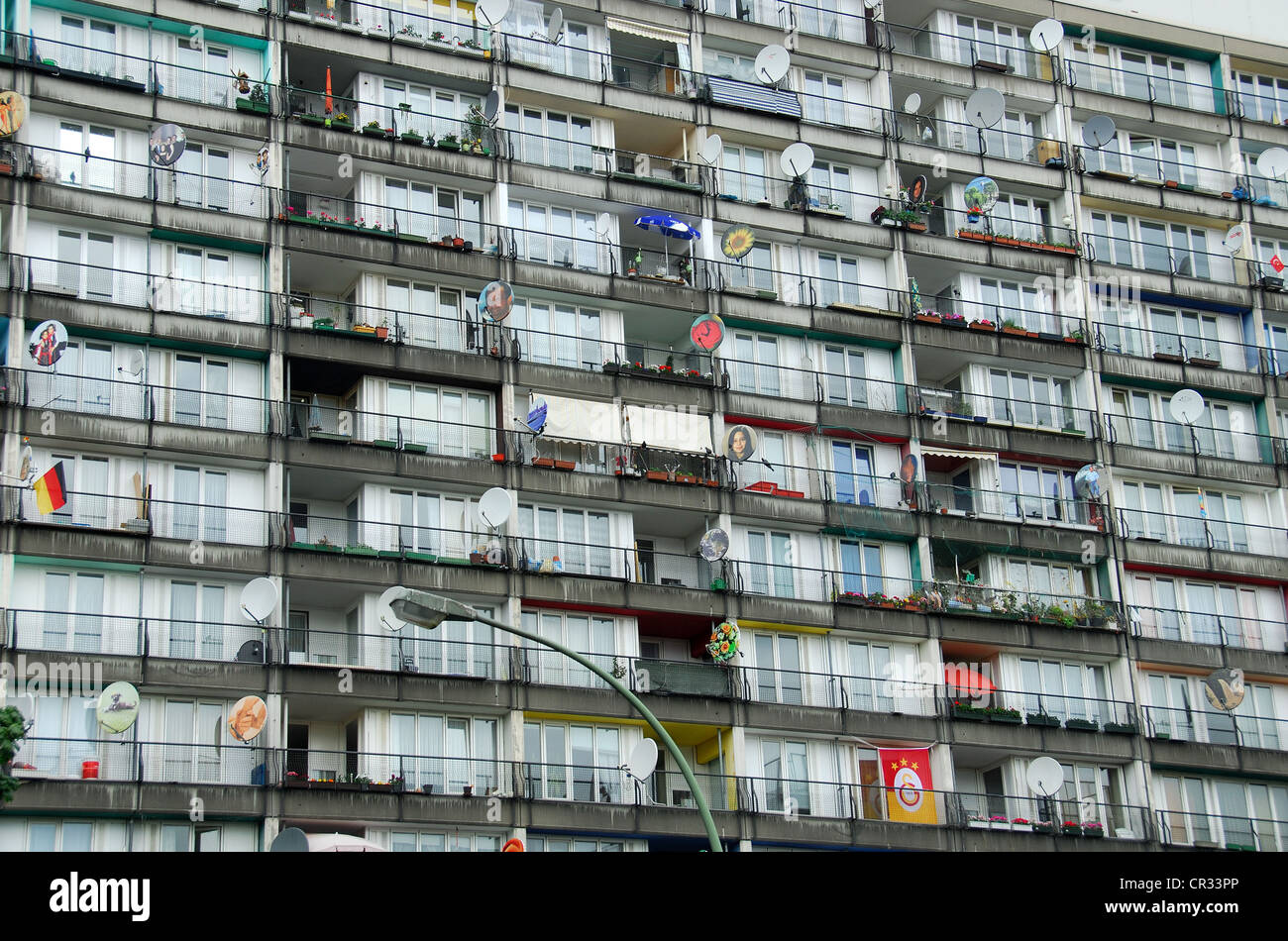 BERLIN, GERMANY. A 1970s apartment block in the Schoneberg district of the city. Note the 'personalised' satellite dishes. 2012. Stock Photo