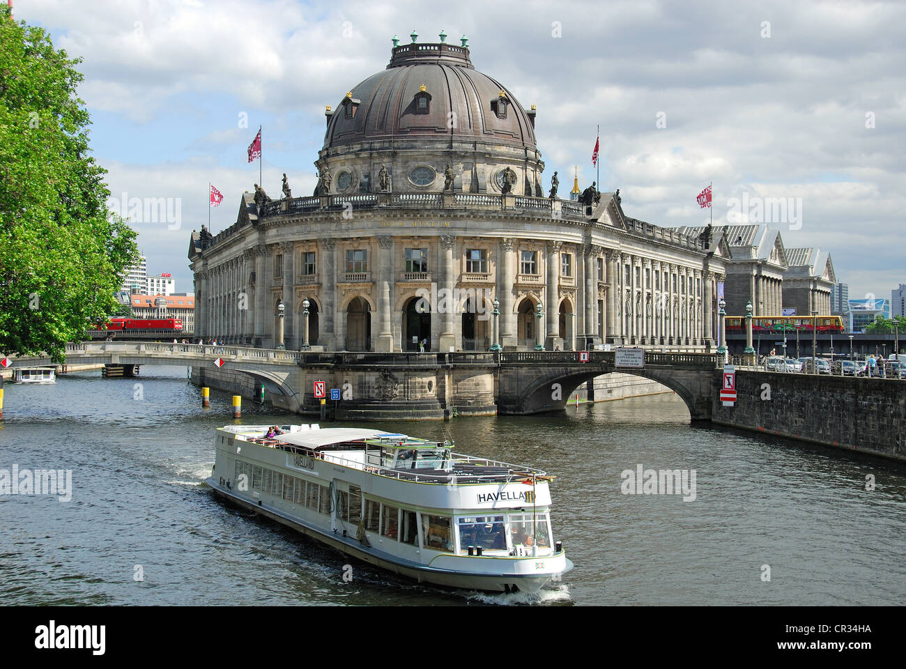 BERLIN, GERMANY. A sightseeing boat on the River Spree, with the Bode ...